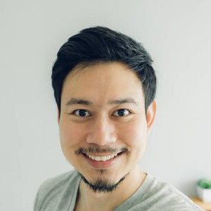 files/137683275-happy-asian-man-selfie-in-his-condominium-room.jpg